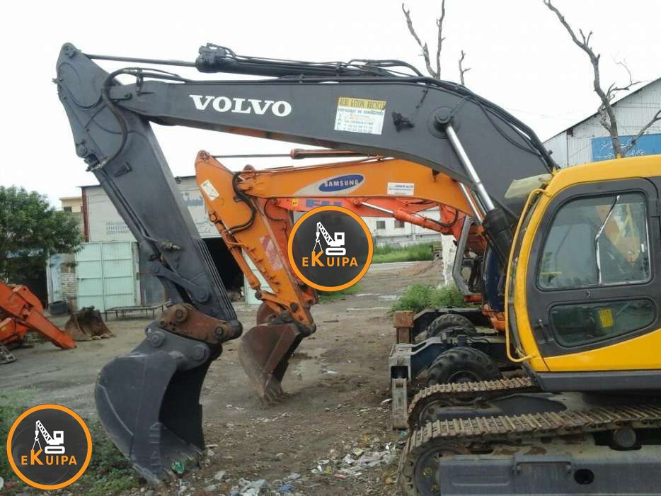 Excavator machine Hitachi ZX 130 Volvo 210